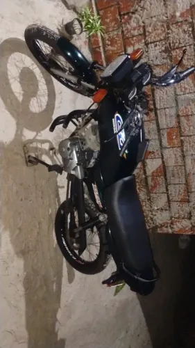 Moto toda em dia no ponto de tranferir