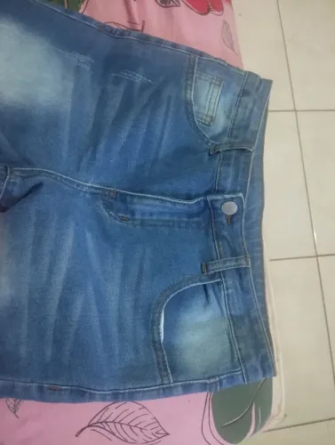 Vendo esse conjunto de roupa para menino de 13 a 14 anos , não serviu no meu filho,tá novo