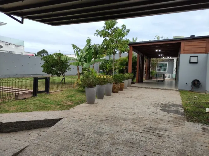 2 terrenos com 1 casa em loteamento com 918 m2