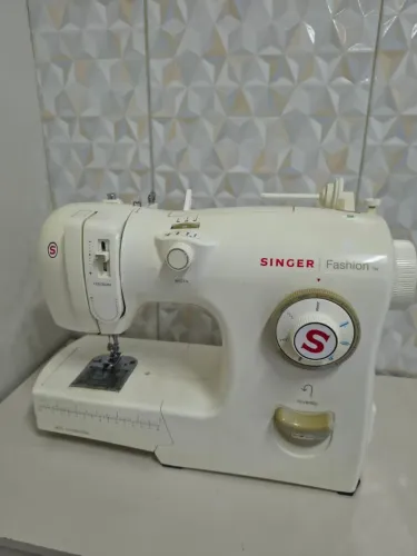 Vendo maquina de costura singer