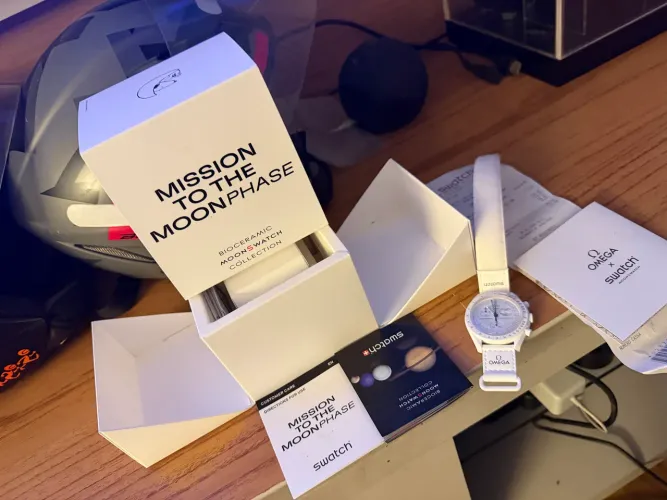 Swatch omega Snoopy moonphase NF avalio trocas