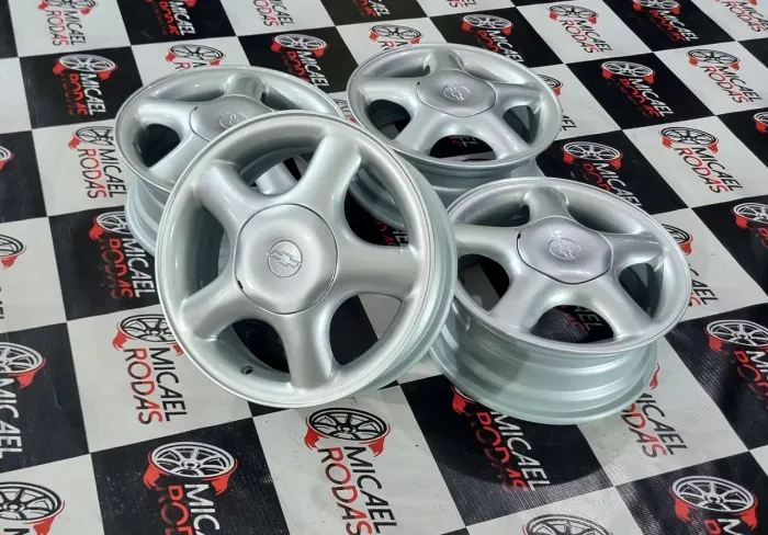 Jogo de rodas 14 GM kadett gls 4x100 Originais Zeradas (calota Original)