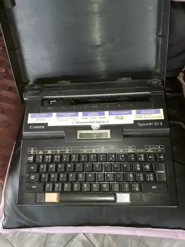 Máquina de escrever elétrica Cânon antiga não testada 