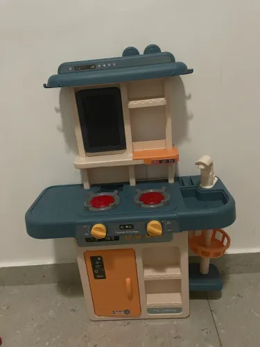 Cozinha infantil que acende e faz barulho