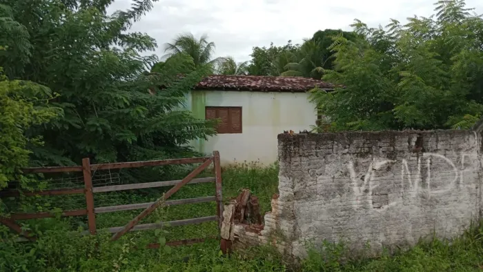 Vende- se terreno em Taborda com uma casa