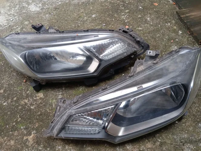 Par de farol Honda fit original 