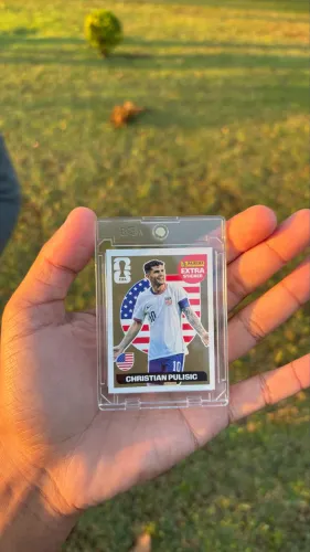Extra Sticker Christian Pulisic Ouro Panini Copa do Mundo FIFA 2026
