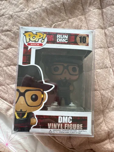 DMC FUNKO VINLY FIGURE na caixa 