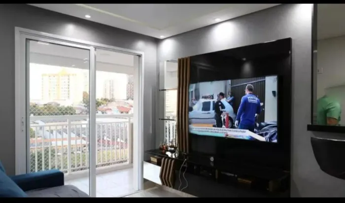 Apartamento com sacada gourmet.