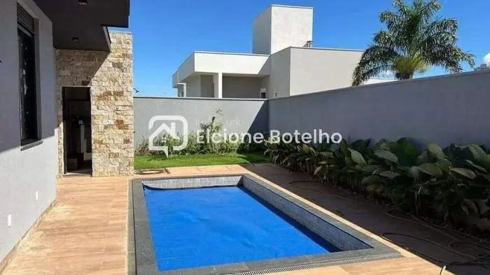 Casa de Condomínio para Aluguel em Uberlândia  3 suítes, 180 m², varanda gourmet
