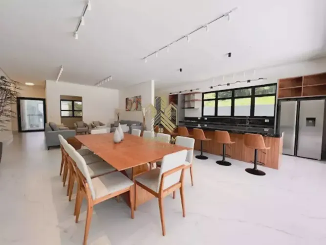 Casa de condomínio para aluguel com 04 suítes, piscina e churrasqueira