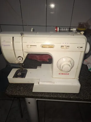 Maquina singer muito boa