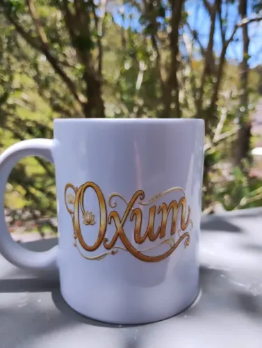 Caneca em Cerâmica Oxum