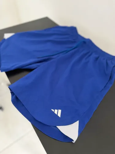 Short treino adidas