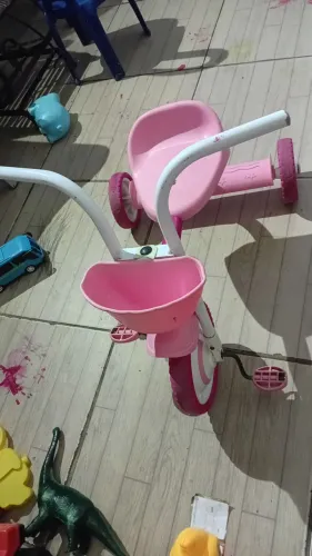 Triciclo rosa infantil