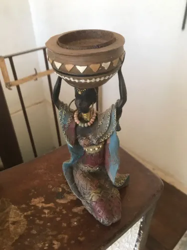 Estatueta castiçal