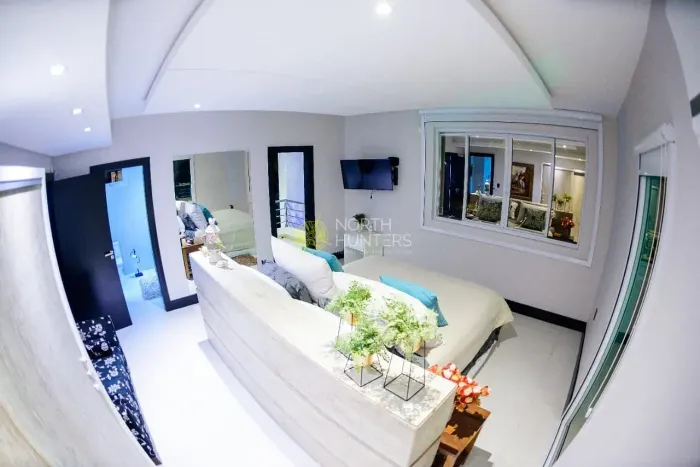 Casa pé na areia na Daniela envolto a natureza