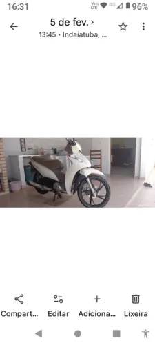 Vendo biz Branca perolizado com banco marron único dono Flex porém nunca usado álcool