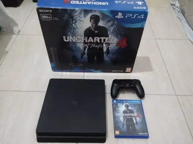 Vendo PlayStation 4 slim,com caixa e nota fiscal,com conta com vários jogos