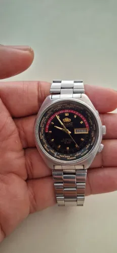 Relógio orient hora mundial original vendo olx pay mais entrega para todo Brasil 