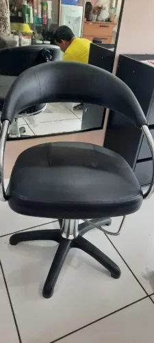 Cadeira de salão de beleza.