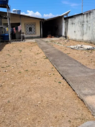 Terreno titulado com casa