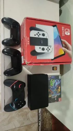 Nintendo switch oled+ dock reserva e controle + 2 jogos