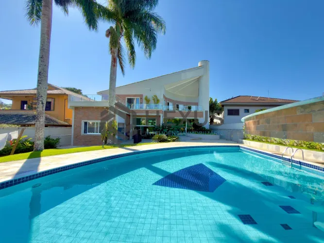 Casa de alto padrão com piscina e área gourmet no Jardim Acapulco, Guarujá