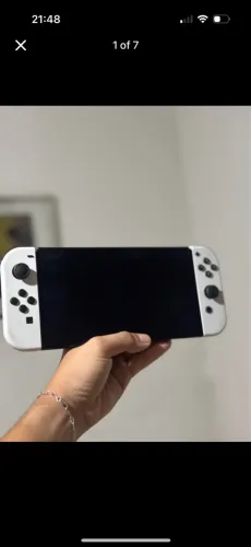 nintendo switch oled leia a descrição