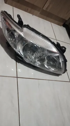 FAROL ESQUERDO COROLLA 