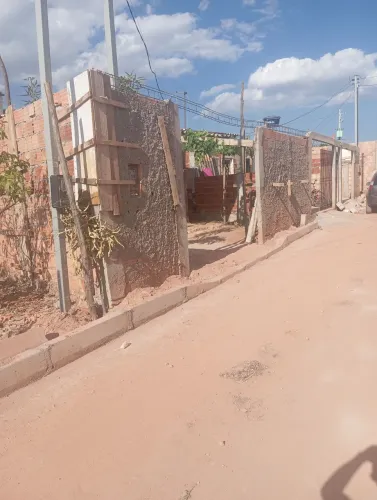 Lote com casa