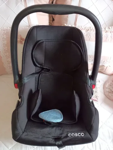 Bebê conforto.