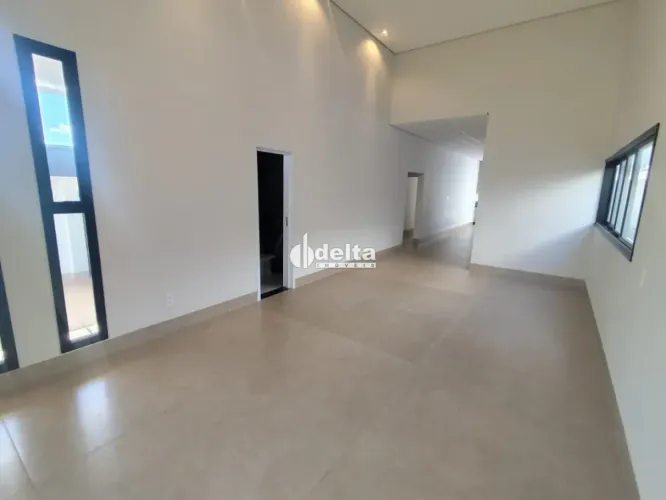 Casa em condomínio com 3 suítes disponível para locação e venda no bairro Gávea em Uberlân