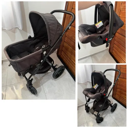 Carrinho de bebê com bebê conforto COSCO