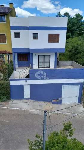 Casa em condomínio fechado, 4 dormitórios, 4 vagas, bairro Cavalhada em Porto Alegre.