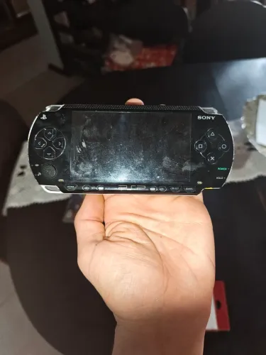 PSP 1000 Sucata para a Retirada das Peças+Fonte Original Sony + Jogo Ratchet & Clank Brind