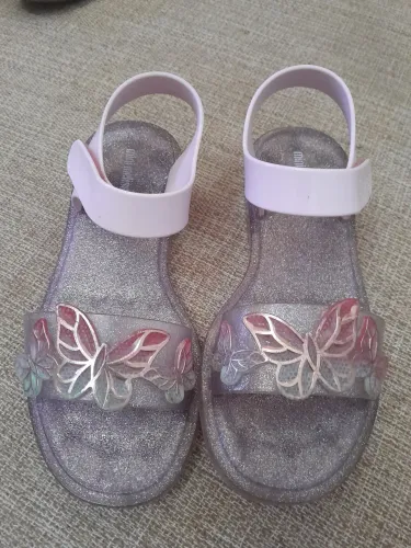 sandalia minimelissa 32 lilas com dourado .