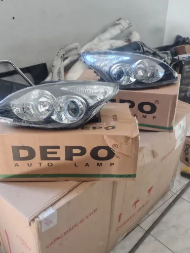 Par de farol Hyundai i30 elétrico 2010