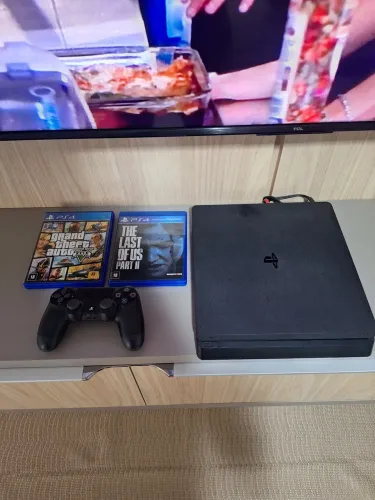 PlayStation 4 Slim 500 GB, funcionando perfeitamente, em ótimo estado.