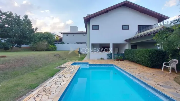 CASA A VENDA COM 3 SUÍTES E PISCINA EM CONDOMINIO NA REGIÃO DO ALPHAVILLE CAMPINAS - SP