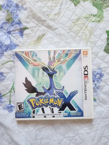 Pokemon X com manuais
