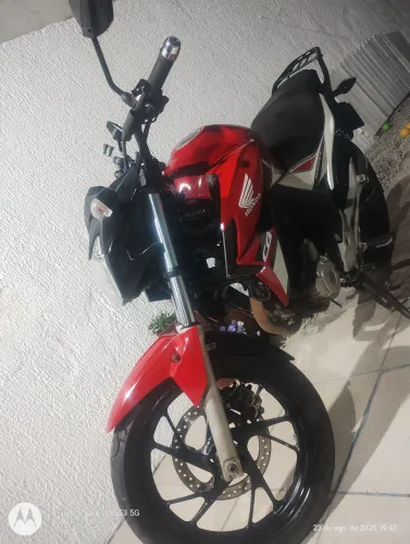 Moto bem cuidada .. Pego moto menor valor restante em dinheiro