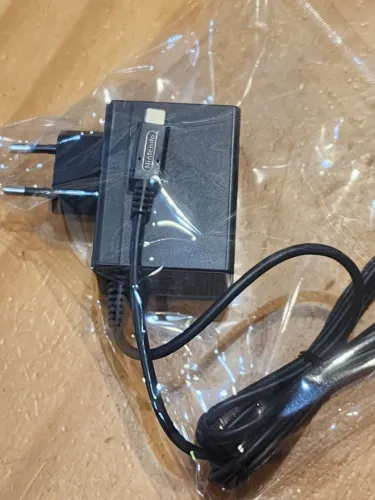 Fonte bivolt de nintendo switch padrão nacional original