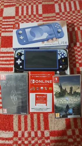 Nintendo switch lite com caixa original e jogos