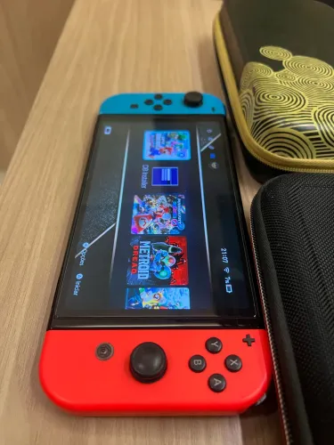 Nintendo Switch Oled desbloqueado 2 bags e jogos