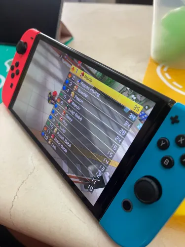 Nintendo Switch OLED + 5 Jogos Originais + Case - Excelente Estado
