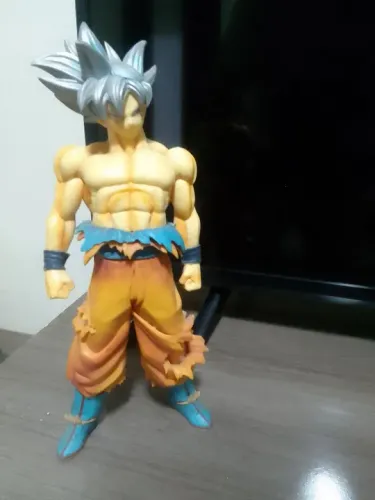 Goku extinto superior 25 CM