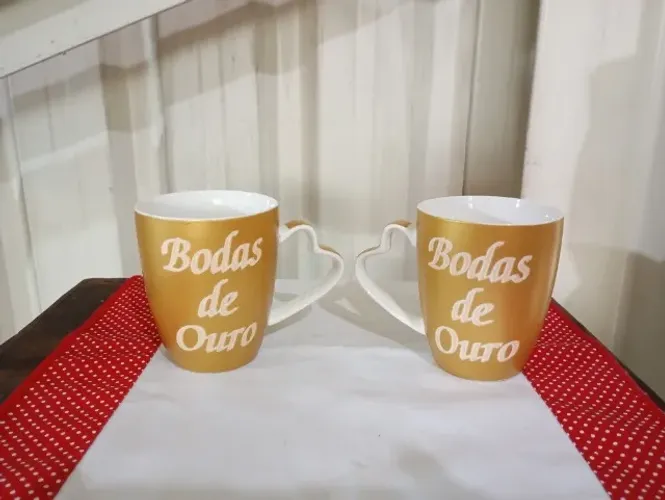 par canecas grandes porcelana peça antiga sem uso.