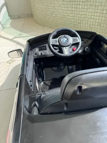 Carrinho Infantil Elétrico Bmw Gt 12v Com Controle Remoto Cor Preto
