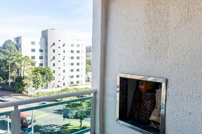 Apartamento com Sacada Churrasqueira Morro Santana com 1 vaga de garagem